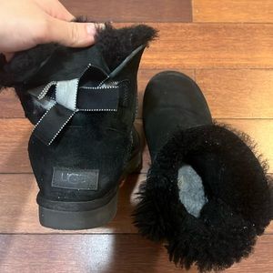 Ugg boots in black with bow on the back in women’s size 7